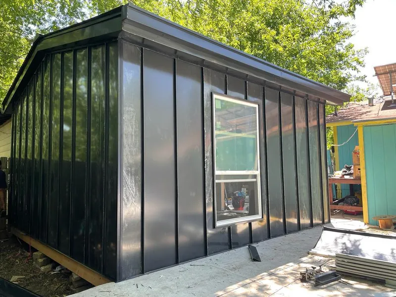 Black standing seam metal wall panels for Roof Inspection in Sandown